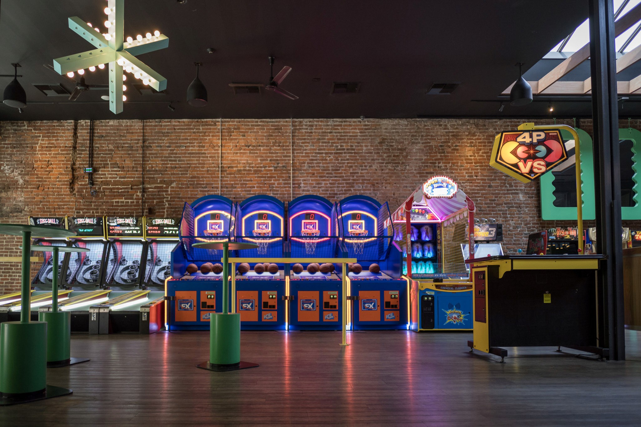 Arcade with neon lights and brick walls