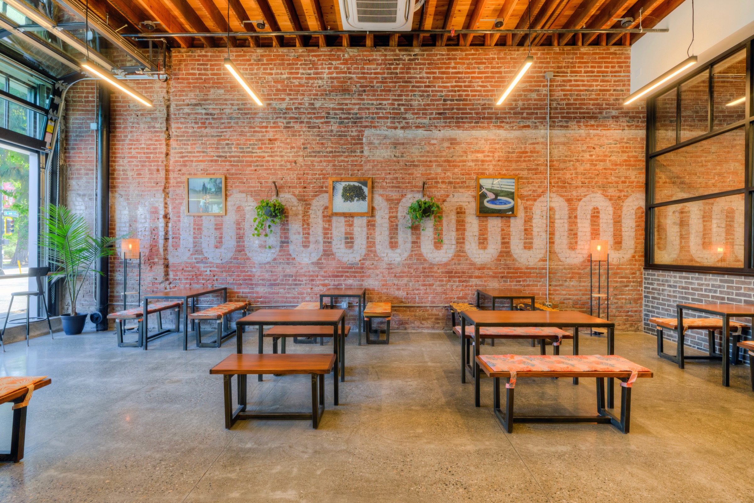 Restaurant interior with wood tables