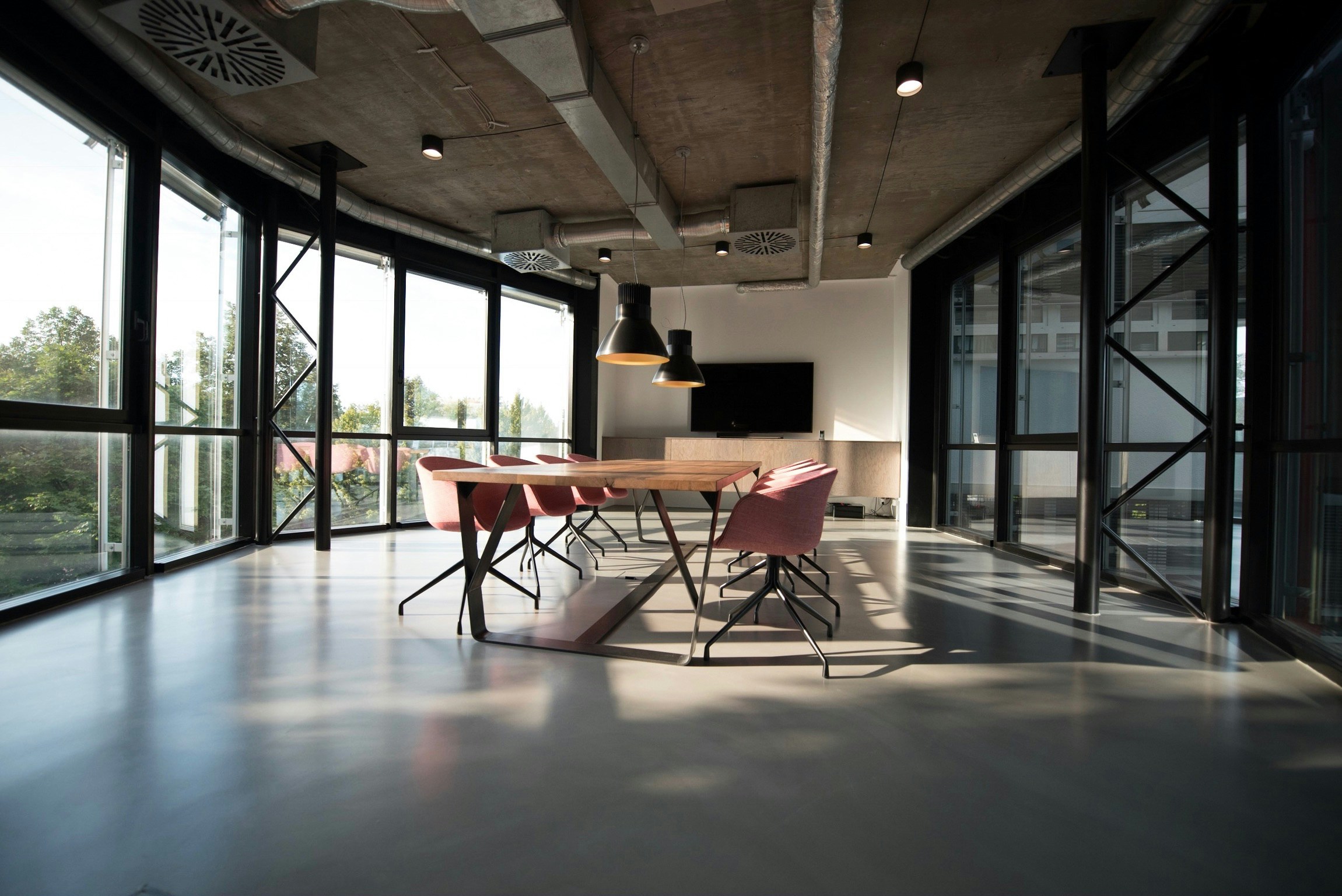 Dining table and chairs in a finished commercial interior