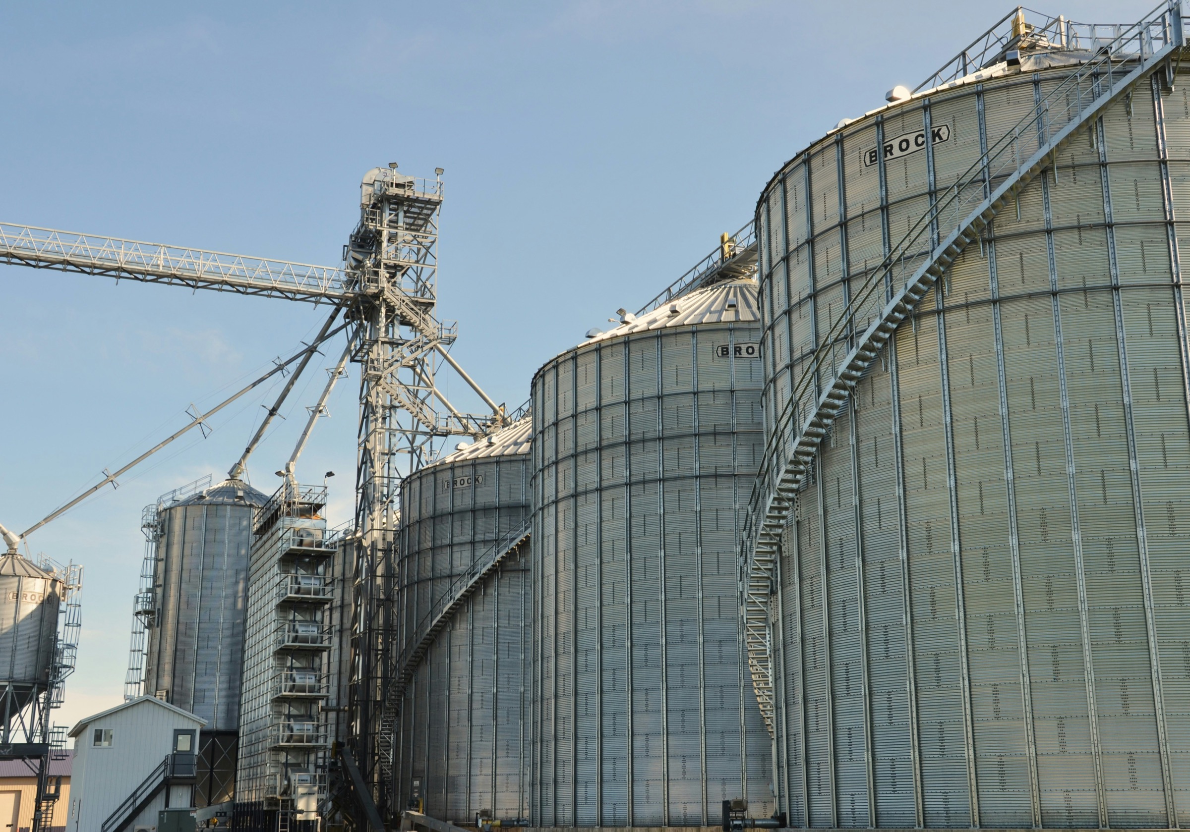 Metal grain silos at an industrial complex